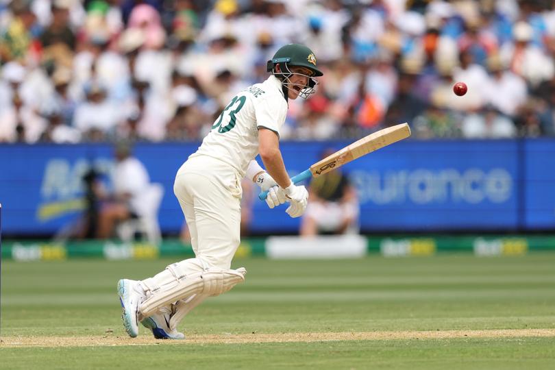 MELBOURNE, AUSTRALIA - DECEMBER 26: Marnus Labuschagne of Australia yells after playing a shot during day one of the Men's Fourth Test Match in the series between Australia and India at Melbourne Cricket Ground on December 26, 2024 in Melbourne, Australia. (Photo by Robert Cianflone/Getty Images)