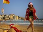 Australians will flock to the beach this Christmas as temperatures across the nation soar.  (Steven Saphore/AAP PHOTOS)