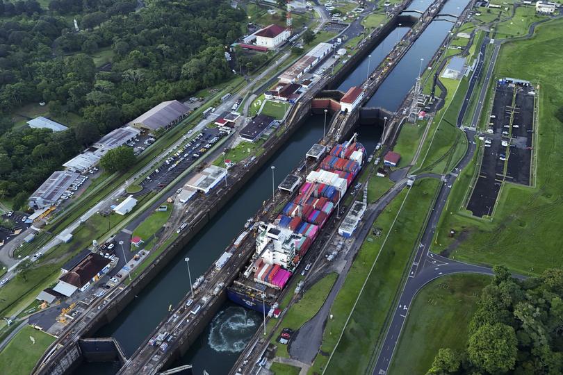 A cargo ship traverses the Agua Clara Locks of the Panama Canal in Colon, Panama.