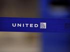 A body was found in the wheel well of a United plane's landing gear, after it arrived in Maui. (AP PHOTO)