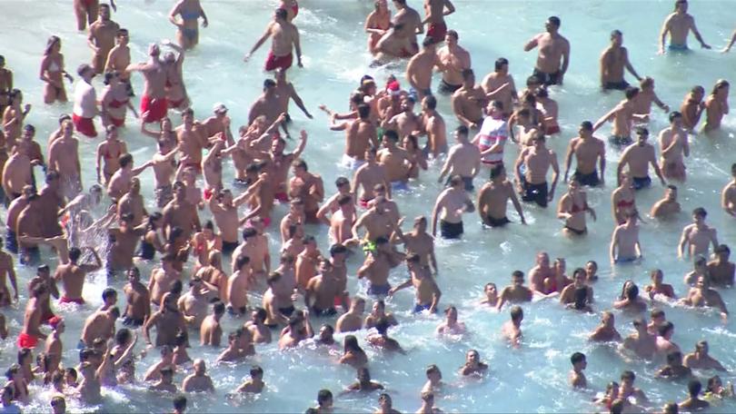 Massive crowds packed into Bronte Beach on Wednesday to celebrate Christmas.