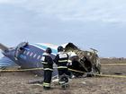 epa11792901 A handout photo made available by the press service of the Ministry for Emergency Situations of Kazakhstan shows emergency specialists working at the crash site of a passenger plane near Aktau, Kazakhstan, 25 December 2024. Azerbaijan Airlines Embraer ERJ-190AR passenger plane flying from Baku to Grozny crashed some three kilometres away from the city of Aktau. According to preliminary information, the incident was caused by a collision between the aircraft and a flock of birds. EPA/KAZAKHSTAN EMERGENCIES MINISTRY HANDOUT -- BEST QUALITY AVAILABLE -- MANDATORY CREDIT -- HANDOUT EDITORIAL USE ONLY/NO SALES KAZAKHSTAN EMERGENCIES MINISTRY HANDOUT