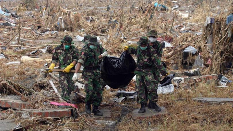 People in Indonesia's Aceh area have been remembering the destruction wrought by the 2004 tsunami. (EPA PHOTO)