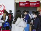 Japan Airlines was told to hurry up restoring its system and to accommodate affected passengers. (AP PHOTO)