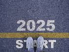 Runner standing at the starting point with 2025 year for starting in new year 2025 to achieve business planing and success concept.