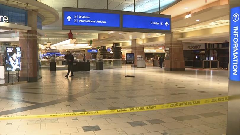 Police investigate a Christmas shooting at Sky Harbor Airport in Phoenix.