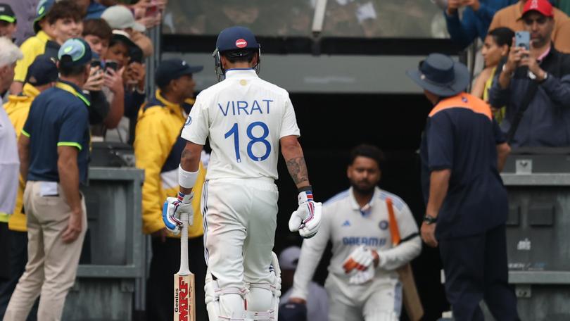 Virat Kohli trudges off after a horror ending to Day 2.