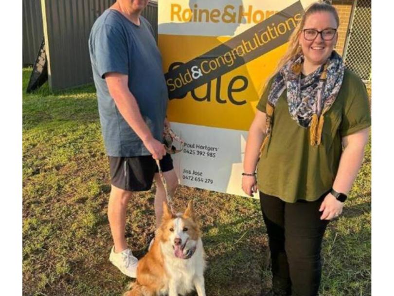 Jono Fren and wife Dani celebrating their first home purchase.