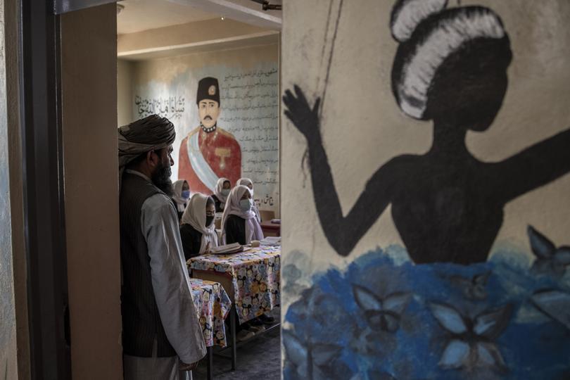 A Taliban official checking on a girls’ classroom in Mazar-i-Sharif, Afghanistan, after the group’s takeover of the country in 2021