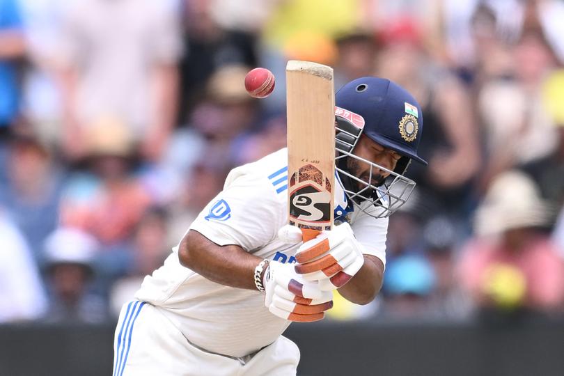 Rishabh Pant of India is struck by the ball.