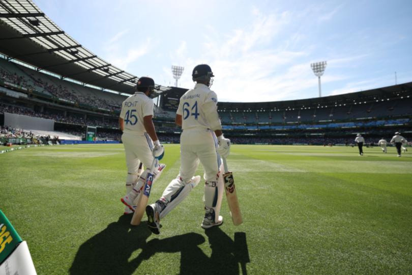 Rohit Sharma and Yashasvi Jaiswal of India take to the field.