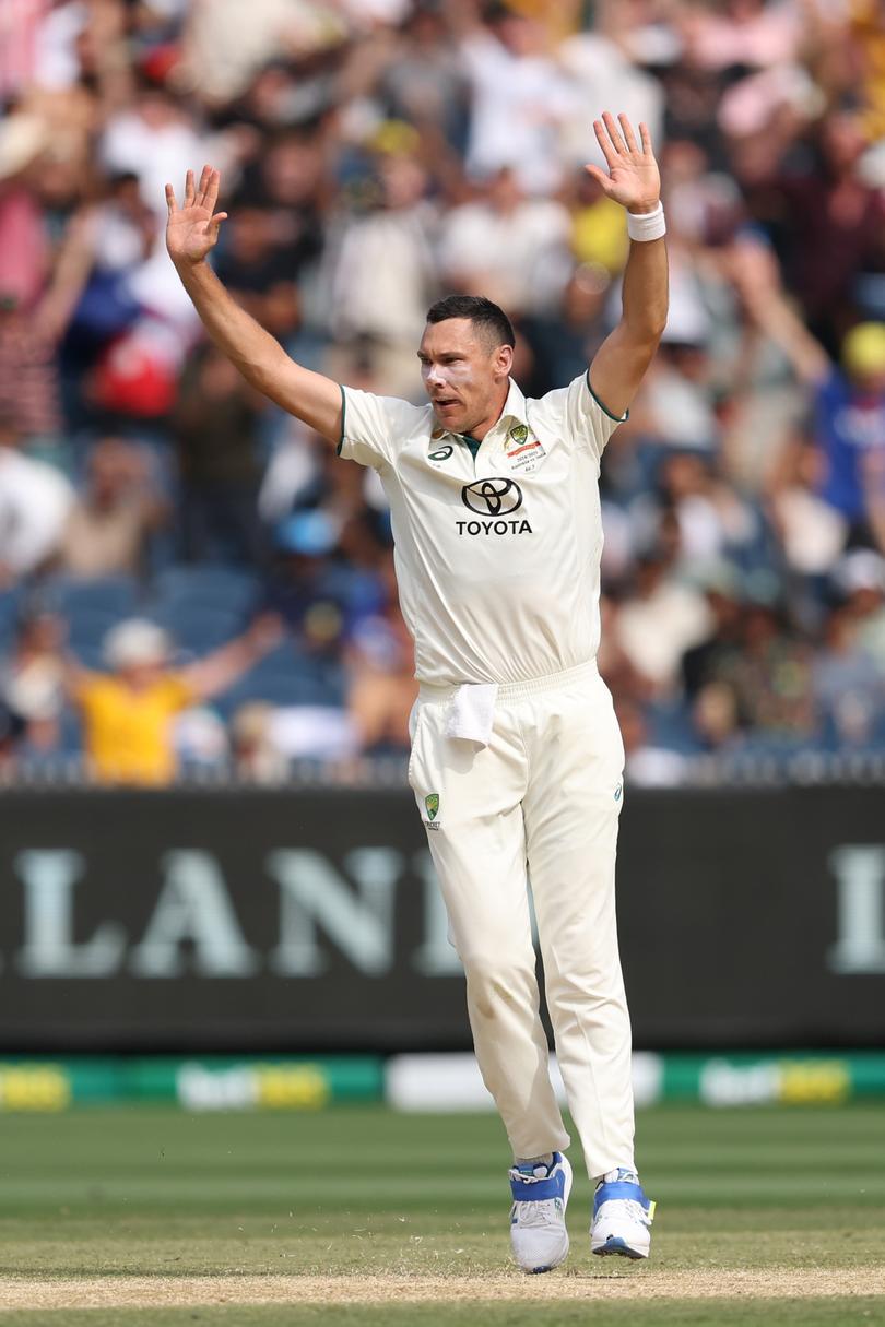 MELBOURNE, AUSTRALIA - DECEMBER 30: Scott Boland of Australia appeals for the wicket of  Akash Deep of India during day five of the Men's Fourth Test Match in the series between Australia and India at Melbourne Cricket Ground on December 30, 2024 in Melbourne, Australia. (Photo by Robert Cianflone/Getty Images)