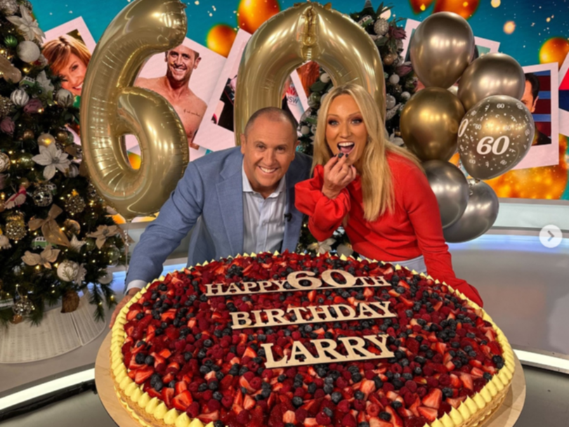 Sally Bowrey and I with my giant 60th birthday cake.