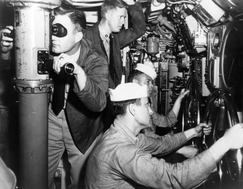 U.S. Navy Lt. Jimmy Carter, centre top, on the bridge of the submarine USS K-1 in 1952.