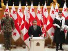 Mikheil Kavelashvili takes the oath during his swearing-in ceremony at the parliament in Tbilisi.