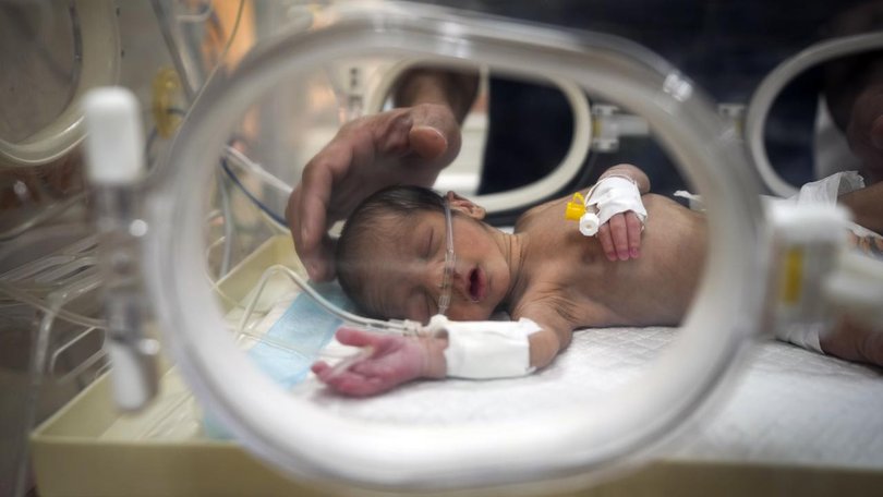 Twenty-day old Ali al-Batran is fighting for life and his twin brother froze to death in Gaza.