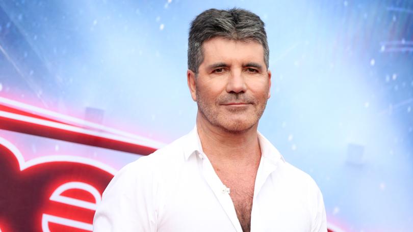 Simon Cowell won’t make a biopic unless he’s dying because he’s worried about offending people. (Photo by Rich Fury/Invision/AP) 