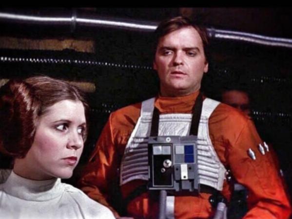 Angus MacInnes as Gold Leader, Jon “Dutch” Vander alongside Carrie Fisher in Star Wars: A New Hope.