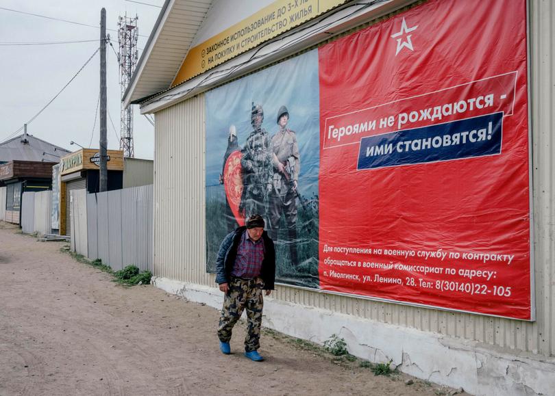 FILE — A recruitment ad by the Russian Army close to Ulan-Ude, Russia, Dec. 4, 2023. From murder suspects to immigrants to a former Olympic gold medalist, Russia pressures those it thinks should fight in Ukraine. (Nanna Heitmann/The New York Times)