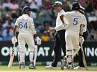 Yashasvi Jaiswal of India speaks with umpires Michael Gough and Joel Wilson after being dismissed.