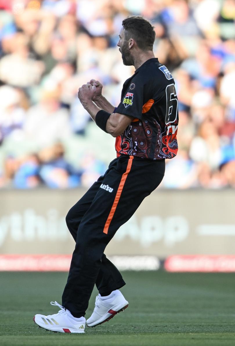 Andrew Tye of the Scorchers  celebrates the wicket of D'Arcy Short.