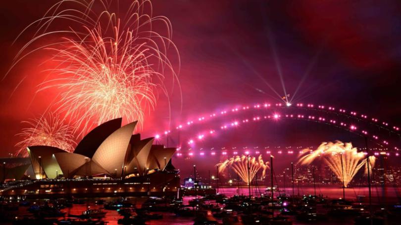 Huge crowds jammed into harbourside vantage points to watch Sydney's "world famous" fireworks. 