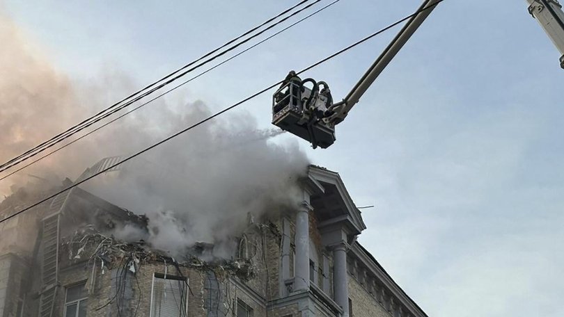 Authorities say two floors of a building in Kyiv were partially destroyed in a Russian drone strike.