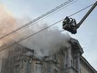 Authorities say two floors of a building in Kyiv were partially destroyed in a Russian drone strike.