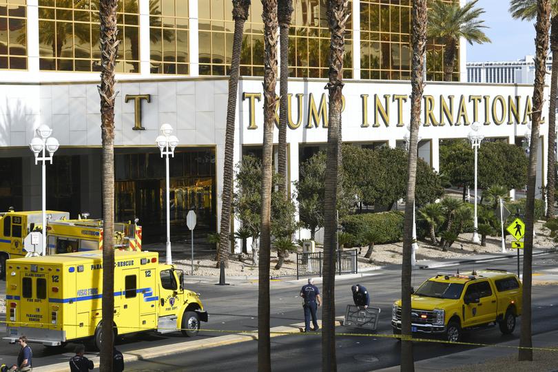 Clark County Fire Department crews work outside Trump International Hotel in Las Vegas after the fire and explosion of a Tesla Cybertruck in the valet area.