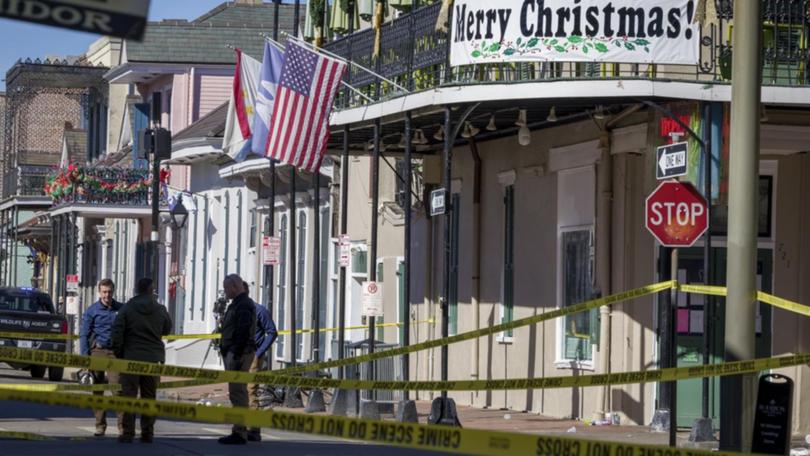 The death toll from a deliberate truck crash in New Orleans has risen to 15, officials say. (AP PHOTO)