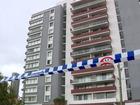 A woman was spotted hanging from a balcony just moments before she plunged to her death from the seventh floor of a Parramatta apartment block early on Thursday morning.