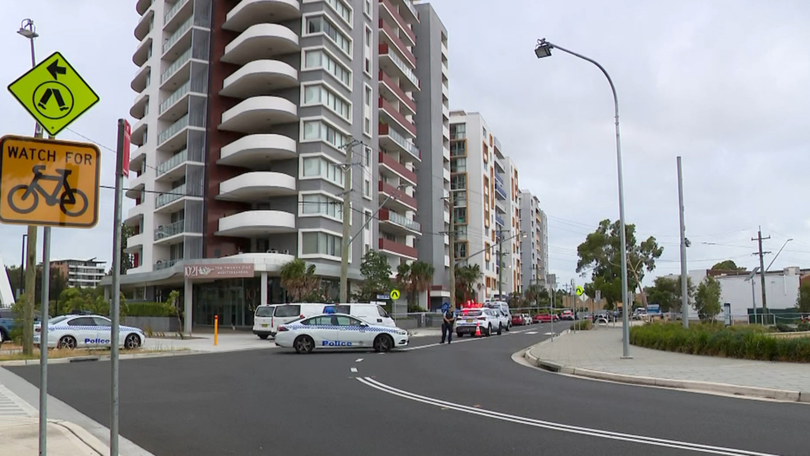 NSW Police have revealed they are investigating a triple-0 phone call made before a woman plunged to her death from the seventh floor of a Parramatta apartment block.