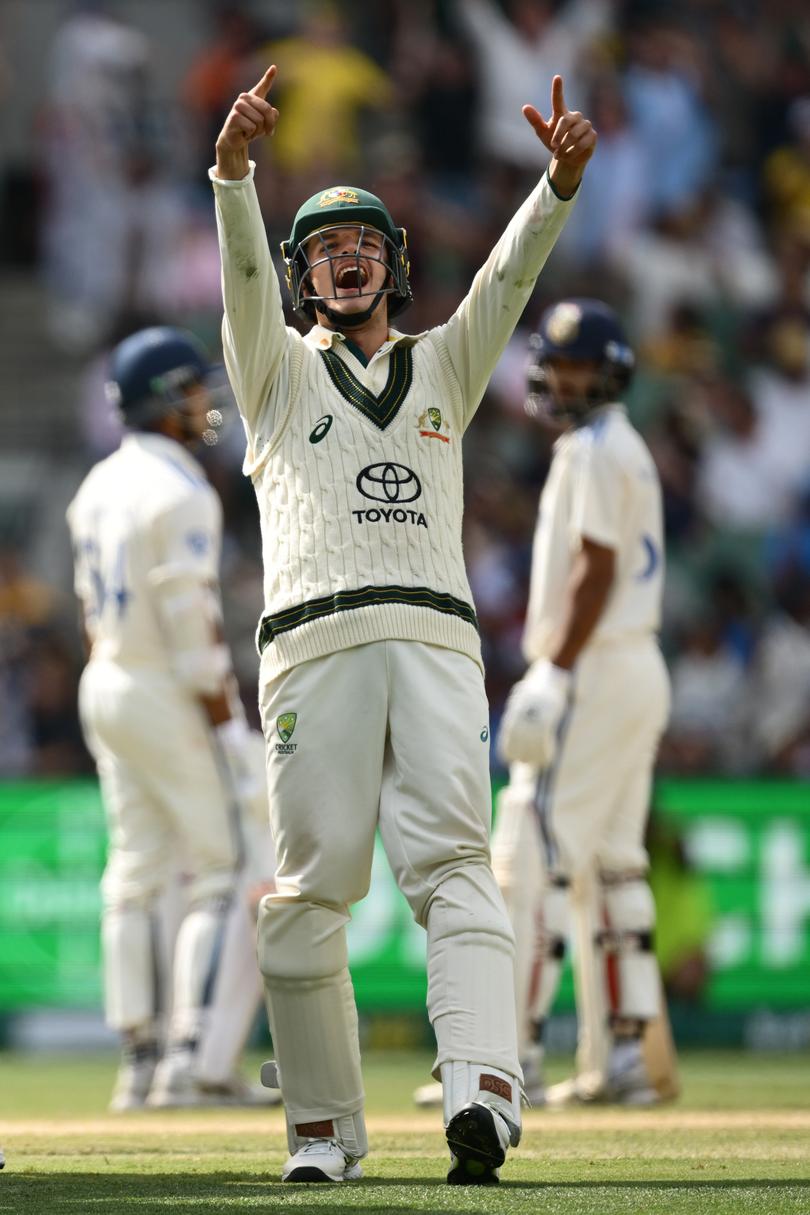 Sam Konstas points to the crowd after Pat Cummins of Australia takes the wicket of Yashasvi Jaiswal.