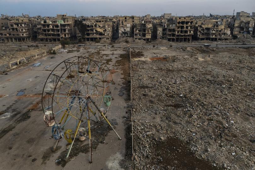 An abandoned ferris wheel in a neighborhood destroyed in the civil war in Damascus, Jan. 1, 2025. (David Guttenfelder/The New York Times)