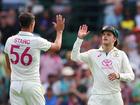 Sam Konstas celebrates with Mitchell Starc of Australia after catching out Prasidh Krishna.