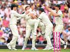 Steve Smith of Australia (centre) celebrates with teammates after taking a slips catch of Virat Kohli of India which was ruled not out by DRS during the Fifth Men's Test match between Australia and India at Sydney Cricket Ground in Sydney, Friday, January 3, 2025. (AAP Image/Dan Himbrechts) NO ARCHIVING, EDITORIAL USE ONLY, IMAGES TO BE USED FOR NEWS REPORTING PURPOSES ONLY, NO COMMERCIAL USE WHATSOEVER, NO USE IN BOOKS WITHOUT PRIOR WRITTEN CONSENT FROM AAP