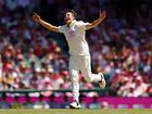 Pat Cummins celebrates after bowling Washington Sundar of India. 