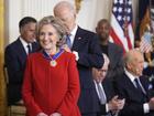 Hillary Clinton was among those receiving the medal for their 'exemplary contributions' to the US. (AP PHOTO)