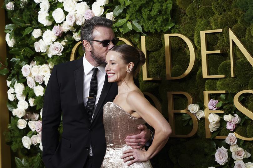 Dax Shepard, left, and Kristen Bell arrive at the 82nd Golden Globes on Sunday, Jan. 5, 2025, at the Beverly Hilton in Beverly Hills, Calif. (Photo by Jordan Strauss/Invision/AP)