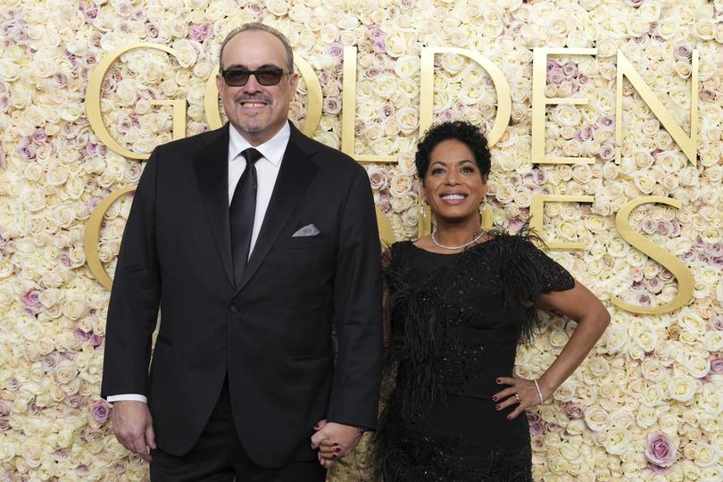 David Zayas, left, and Liza Colon-Zayas arrive at the 82nd Golden Globes on Sunday, Jan. 5, 2025, at the Beverly Hilton in Beverly Hills, Calif. (Photo by Jordan Strauss/Invision/AP)