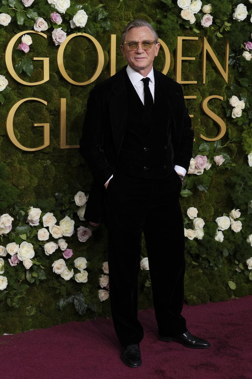 Daniel Craig arrives at the 82nd Golden Globes on Sunday, Jan. 5, 2025, at the Beverly Hilton in Beverly Hills, Calif. (Photo by Jordan Strauss/Invision/AP)