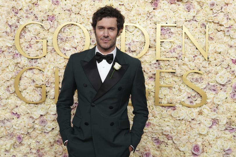 Adam Brody arrives at the 82nd Golden Globes on Sunday, Jan. 5, 2025, at the Beverly Hilton in Beverly Hills, Calif. (Photo by Jordan Strauss/Invision/AP)