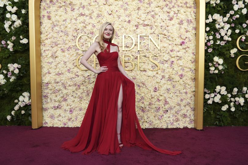 Dakota Fanning arrives at the 82nd Golden Globes on Sunday, Jan. 5, 2025, at the Beverly Hilton in Beverly Hills, Calif. (Photo by Jordan Strauss/Invision/AP)