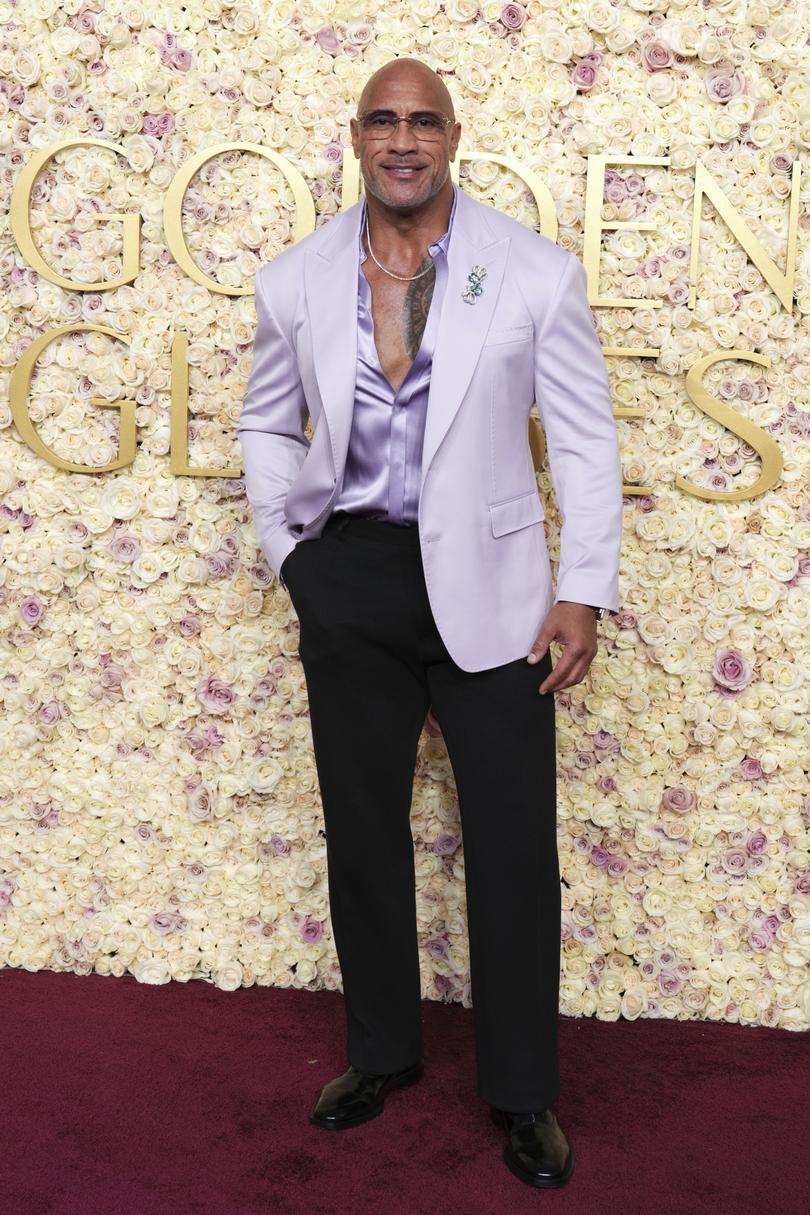 Dwayne Johnson arrives at the 82nd Golden Globes.