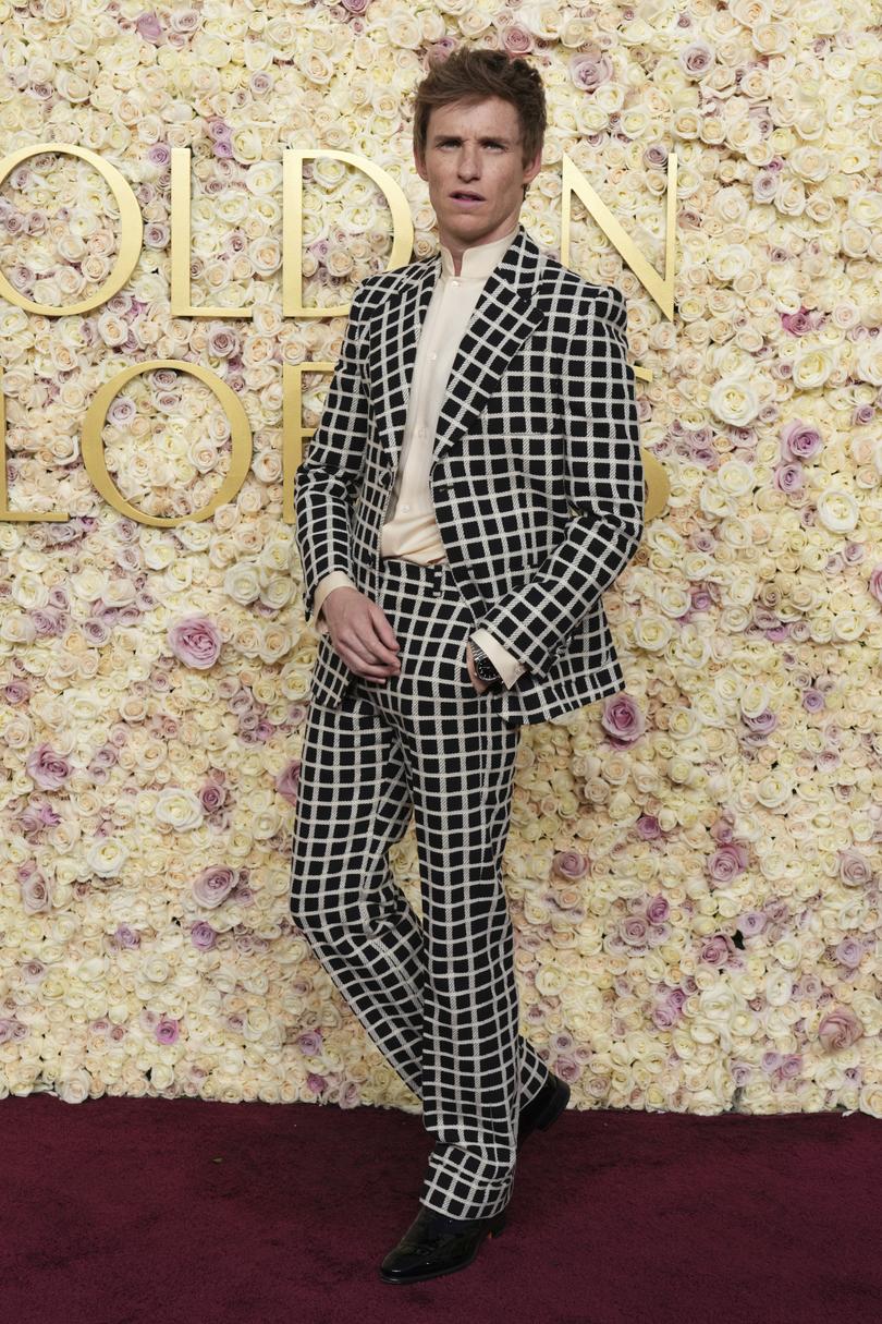 Eddie Redmayne arrives at the 82nd Golden Globes.