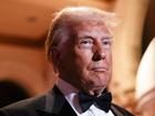 President-Elect Donald Trump speaks to reporters as he arrives to a New Year’s Eve event at Mar-o-Lago Club in Palm Beach, Fla., Dec. 31, 2024. President Joe Biden is bequeathing his successor a nation that by many measures is in good shape, even if voters remain unconvinced.(Eric Lee/The New York Times)