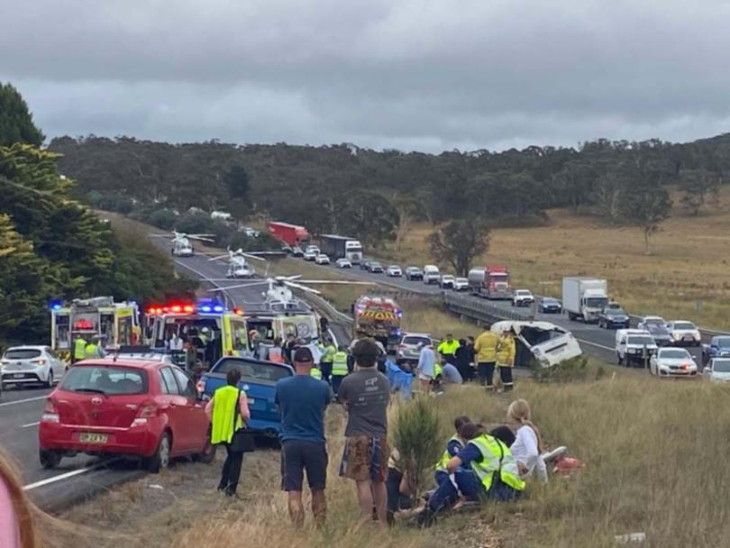 It is unclear what caused the van to roll, causing long traffic delays.