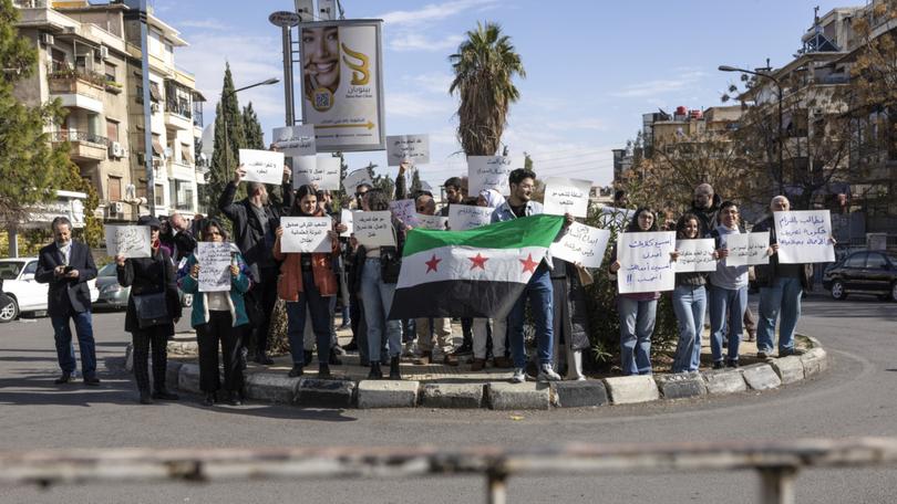 Syrians protest against changes to the public school curriculum outside the Ministry of Education in Damascus, Syria, Jan. 5, 2025. Syria’s new government has swiftly ordered changes to school curriculums.