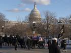 The flag-draped casket of President Jimmy Carter moves toward the US Capitol on a horse-drawn caisson at Constitution Avenue on Capitol Hill.