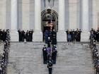 An honor guard carries the casket of late former US President Jimmy Carter into the Rotunda of the US Capitol in Washington, DC, US, on Tuesday, Jan. 7, 2025. Carter, the former Georgia peanut farmer who as president brokered a historic and lasting peace accord between Israel and Egypt in a single term marred by soaring inflation, an oil shortage and Iran's holding of American hostages, died December 29 at 100 years of age. Photographer: Jamal Countess/UPI/Bloomberg